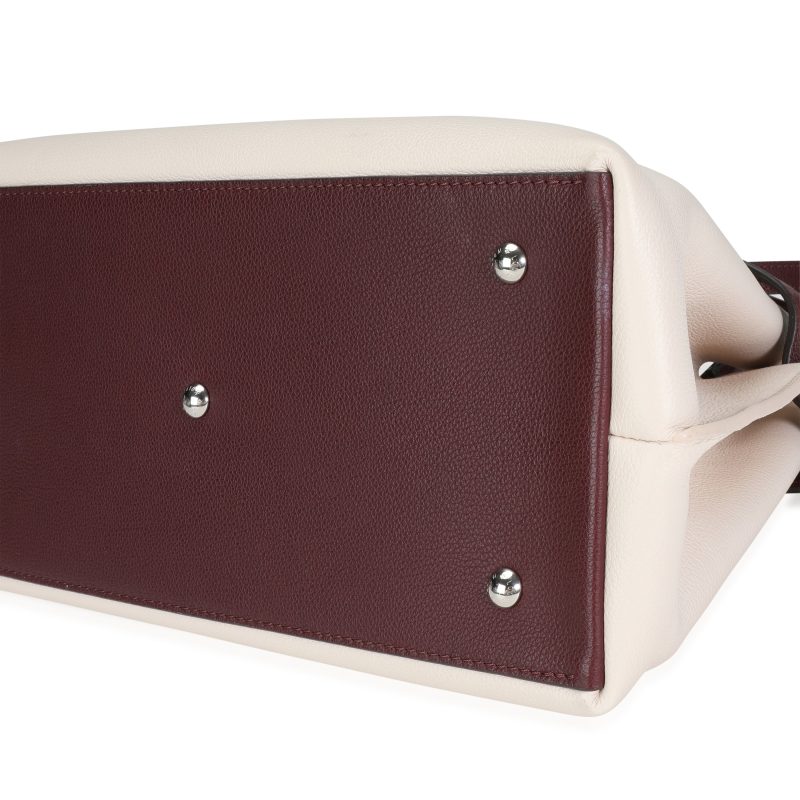 LOUIS VUITTON Cream & Burgundy Grained Calf Leather Lockme Day Bag - Logoexplore - Image 6