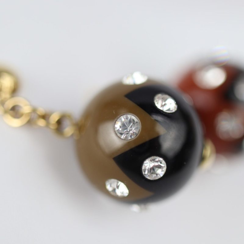 Louis Vuitton Book de Reil Magnetic Earrings M66397 Resin Rhinestone Black Khaki Brick Color Gold Hardware Round - Logoexplore - Image 4