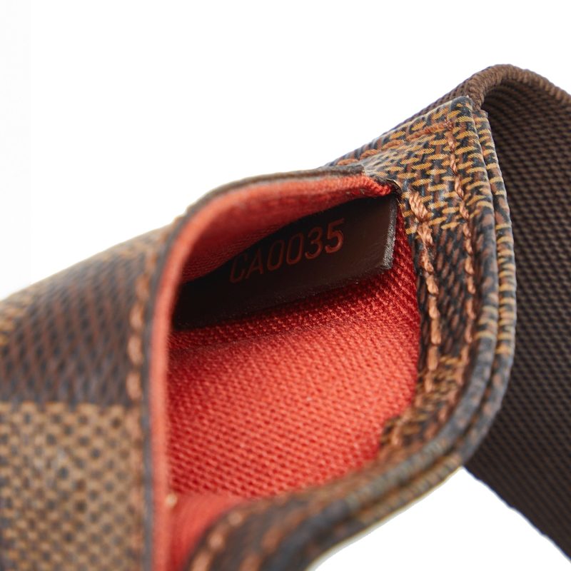 LOUIS VUITTON Damier Ebene Geronimos Crossbody Bag - Logoexplore - Image 7