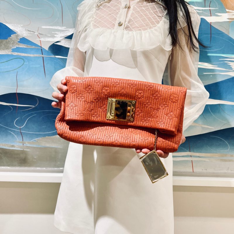 Louis Vuitton Clutch TWS pop - Logoexplore
