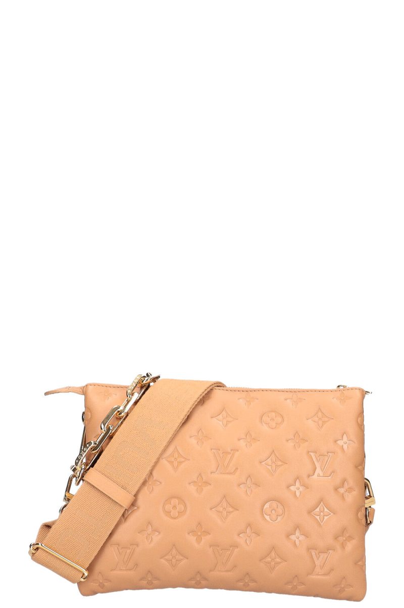 LOUIS VUITTON Coussin PM Bag Beige Empreinte - Logoexplore